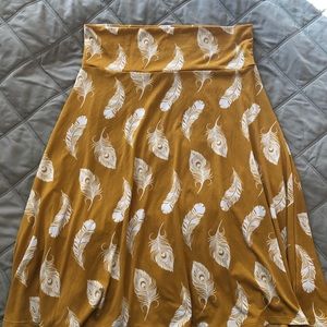 LuLaRoe Azure Skirt SZ L, mustard and feathers